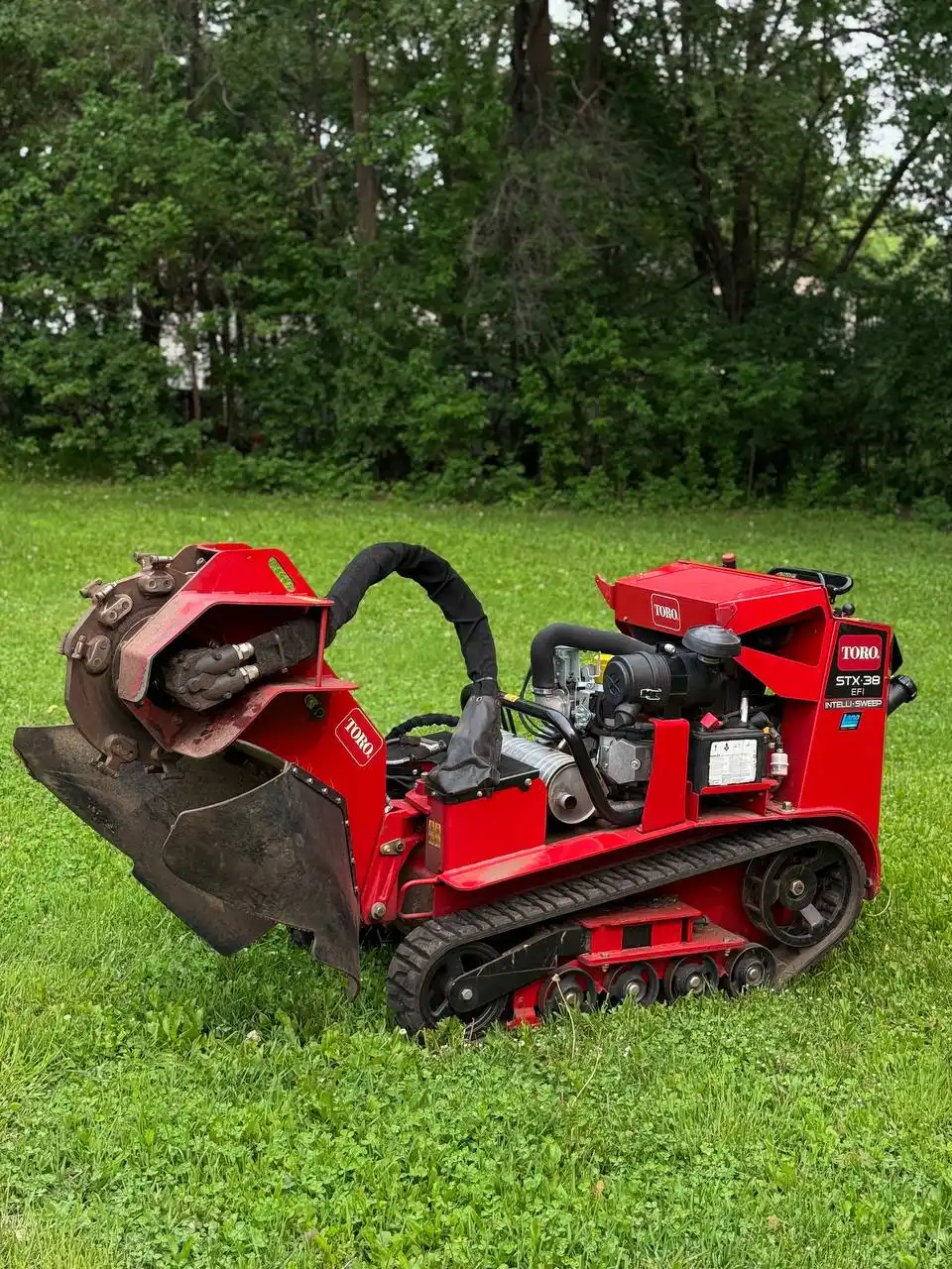 Toro STX-38 stump grinder on residential lawn